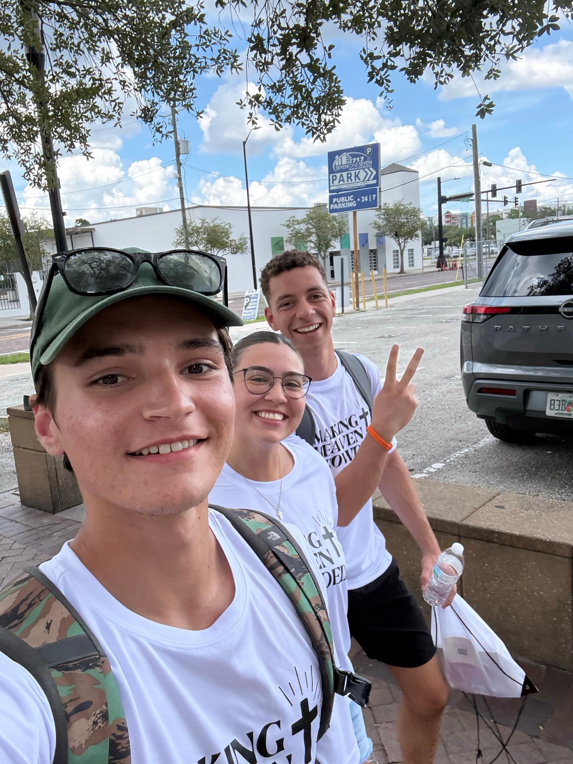 Making Heaven Crowded volunteers walking a street in downtown Tampa during an outreach