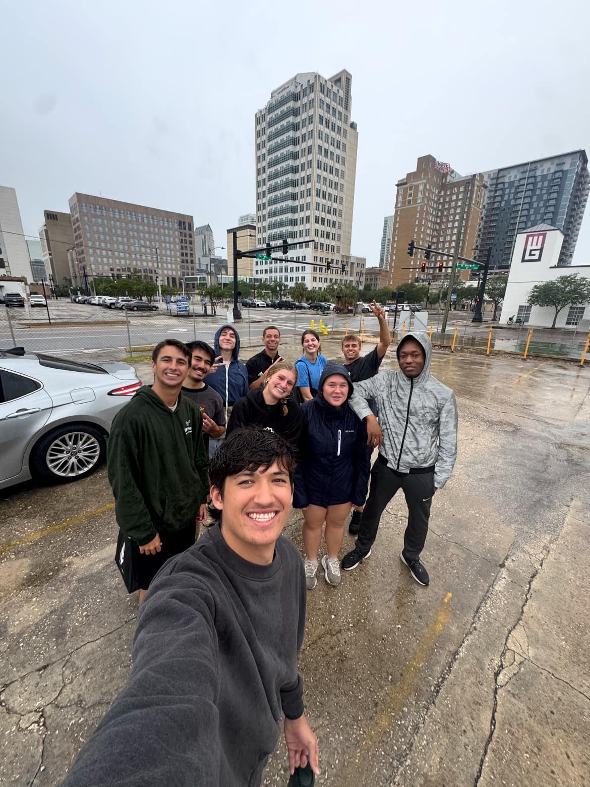The MHC team gathered for a group photo in downtown Tampa after outreach in the rain